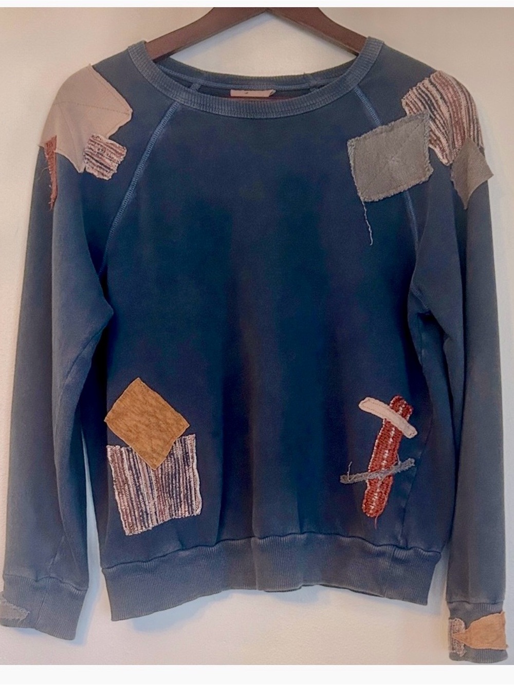 Upcycled patched cotton terry sweatshirt